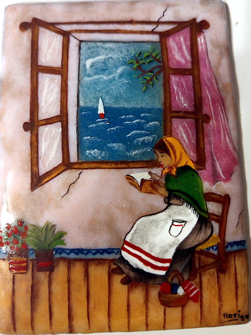 Esmalte: mujer leyendo junto a una ventana abierta al mar